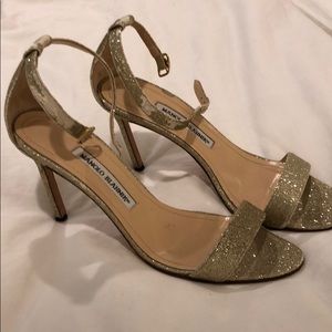 Manolo Blahnik gold (preloved and worn) shoes.